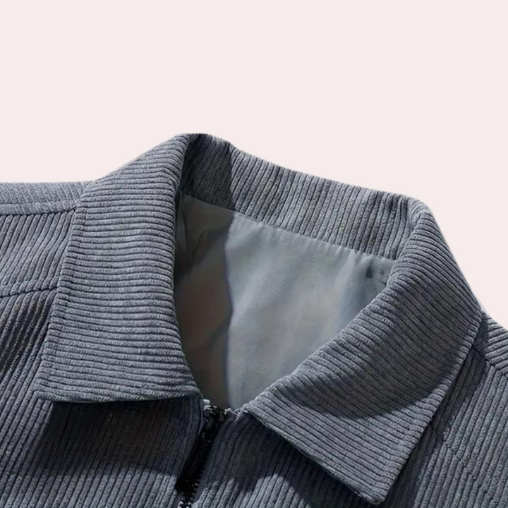 Grijze corduroy jas met opstaande kraag en ritssluiting, stijlvolle herenkleding, trendy herfstmode, comfortabele en duurzame stof.