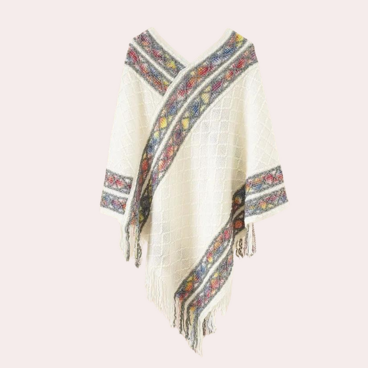 Witte poncho met kleurrijke etnische patronen en franjes, damesmode, bohemian stijl, warme winterkleding, handgemaakt design.