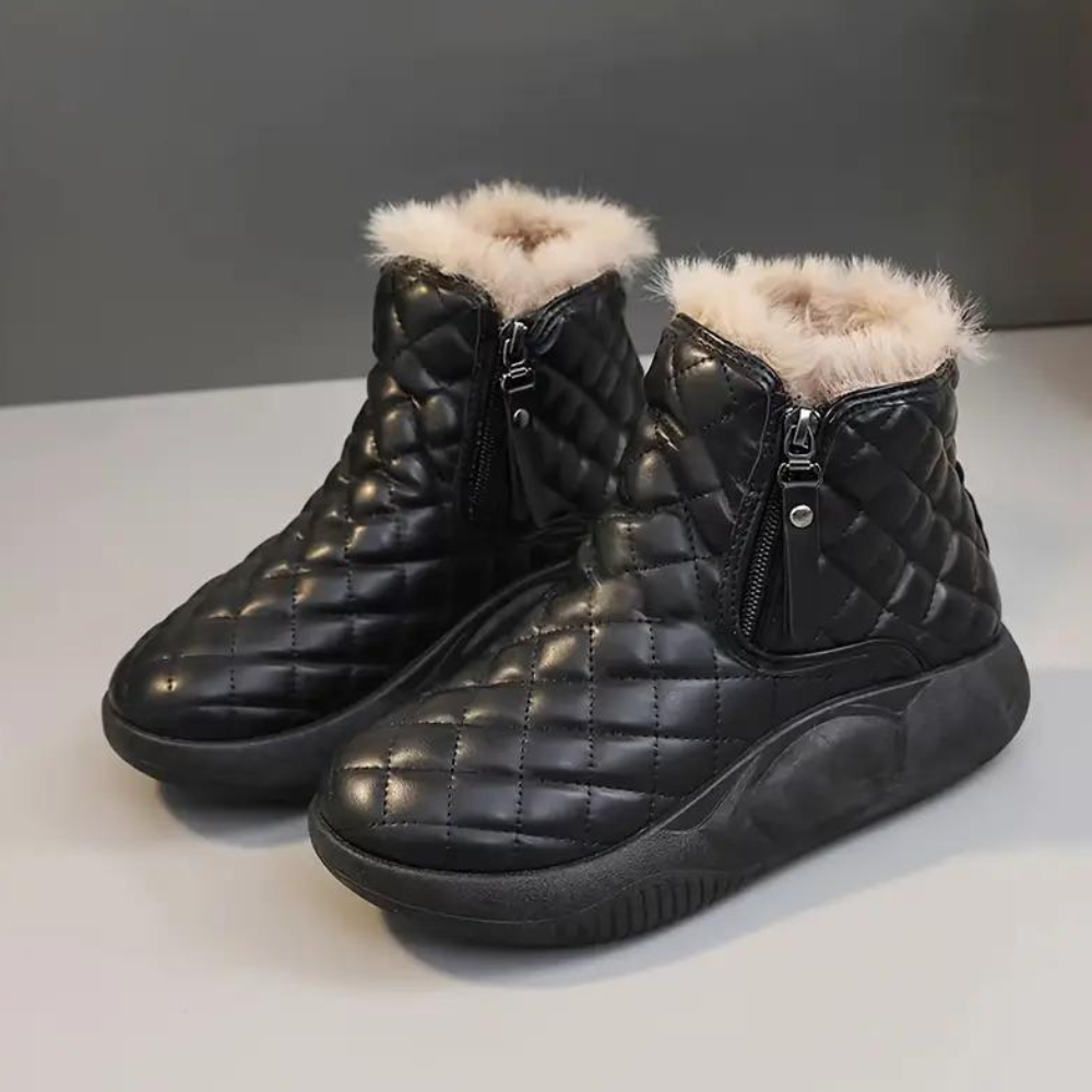 Zwarte gewatteerde winterlaarzen met ritssluiting en warme voering, damesmode, comfortabele en stijlvolle schoenen voor koude seizoenen.