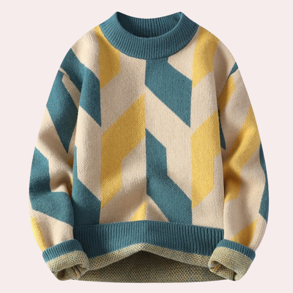 Geometrisch gebreide trui in geel, blauw en crème, met chevronpatroon. Warme herentrui, modieus en comfortabel voor herfst en winter.