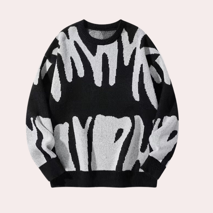 Zwart-witte trui met abstract patroon, ronde hals en lange mouwen. Modieuze herentrui, geschikt voor casual en winterkleding.