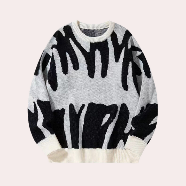 Witte trui met zwart abstract patroon, ronde hals en lange mouwen. Moderne streetwear stijl, unisex design, comfortabele pasvorm.