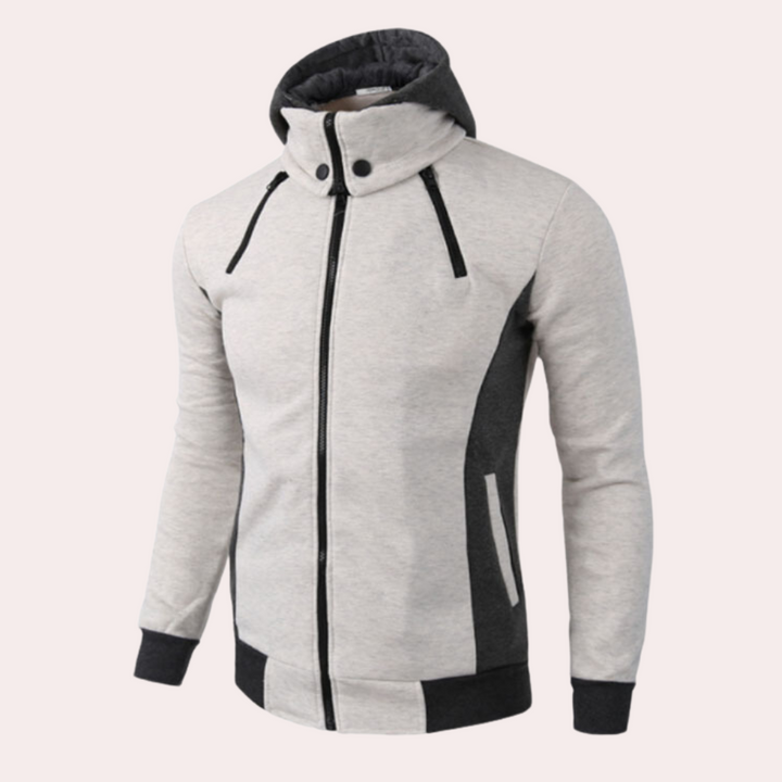 Beige en zwarte herenhoodie met ritssluiting, hoge kraag en capuchon. Stijlvolle sportieve jas, ideaal voor casual en actieve outfits.