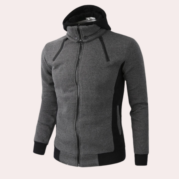 Donkergrijze herenhoodie met ritssluiting, capuchon en zakken. Comfortabele sportkleding, ideaal voor casual en actieve outfits.