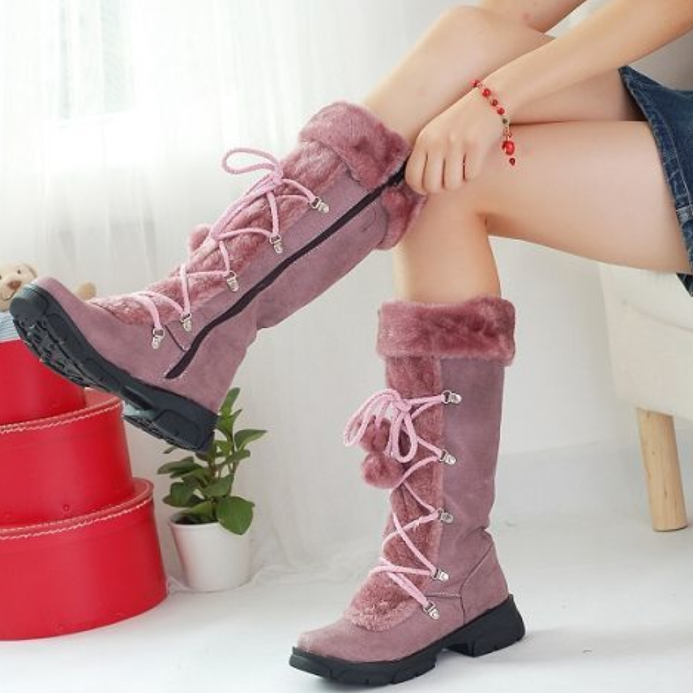 Roze winterlaarzen met bontvoering en veters, comfortabele dameslaarzen, trendy en warm, perfect voor koude seizoenen.