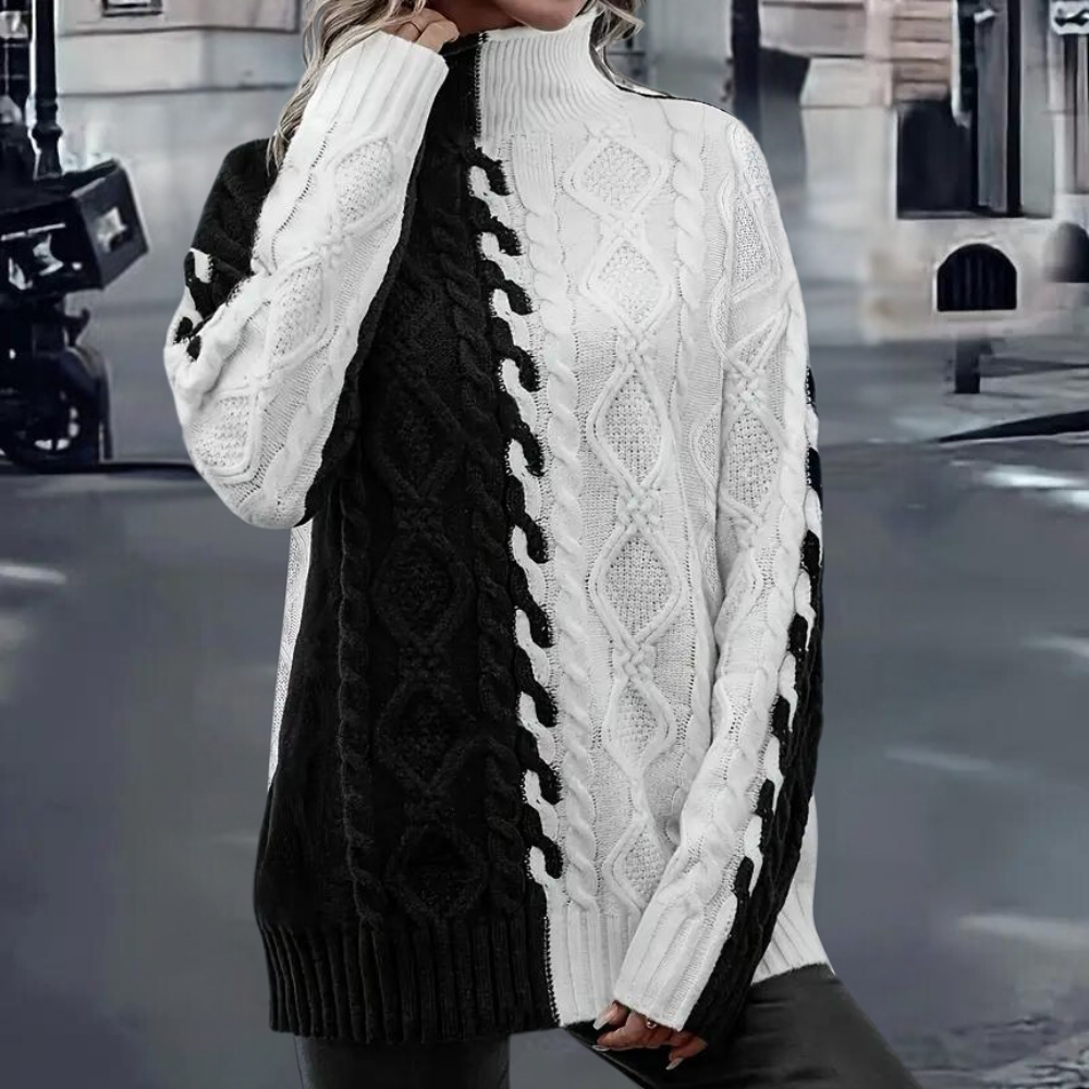 Zwart-witte damestrui met kabelpatroon, coltrui, modieuze winterkleding, straatachtergrond, trendy gebreide kleding, comfortabele pasvorm.