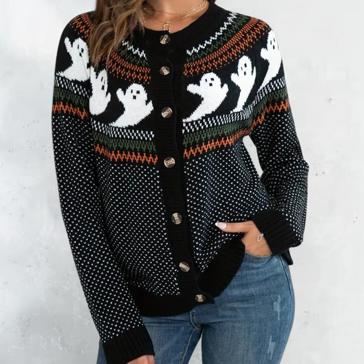 Zwarte damestrui met spookmotief, knopen en kleurrijke accenten. Perfect voor Halloween. Comfortabele pasvorm, ideaal voor herfstmode.