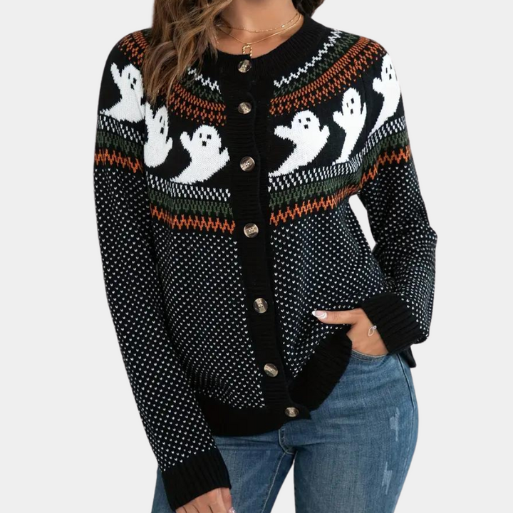 Zwarte damestrui met spookjesprint, knopen en kleurrijke accenten. Perfect voor Halloween. Comfortabele pasvorm, ideaal voor herfstmode.