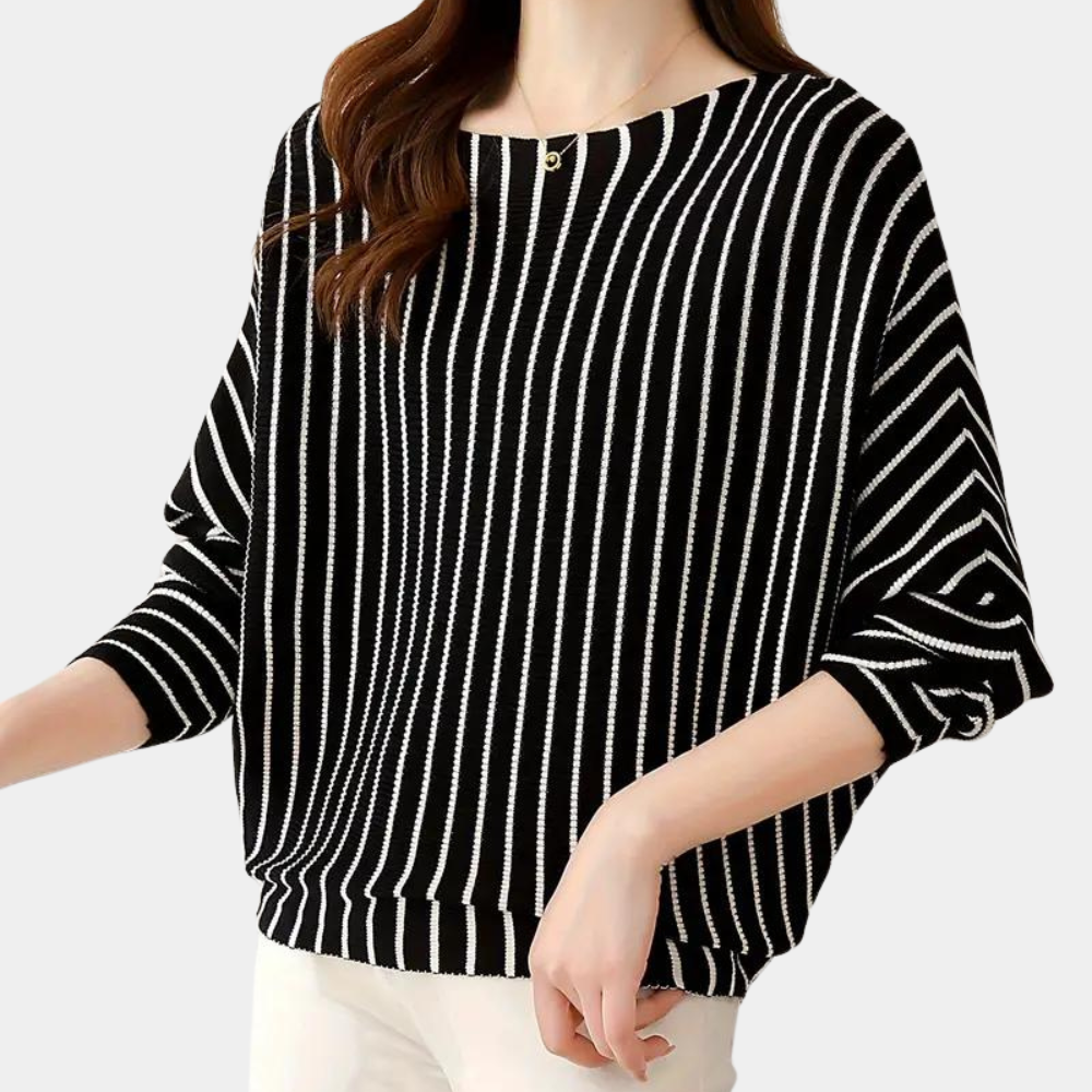 Zwart-wit gestreepte damestrui met driekwart mouwen, casual stijl. Perfect voor modieuze herfst- en winteroutfits. Comfortabel en stijlvol design.