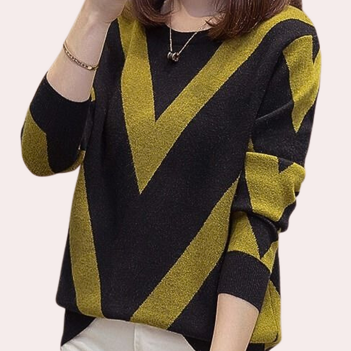 Damestrui met zwart-geel zigzagpatroon, lange mouwen, ronde hals. Modieuze herfstkleding, comfortabele pasvorm, trendy design.
