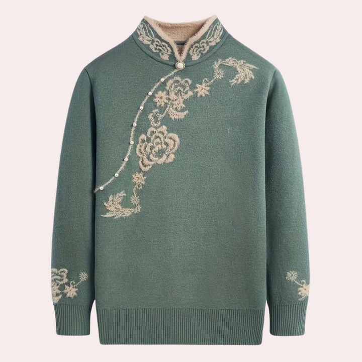 Groene trui met bloemenborduursel en pareldetails, hoge kraag, damesmode, herfst-winter collectie, elegant en stijlvol design.