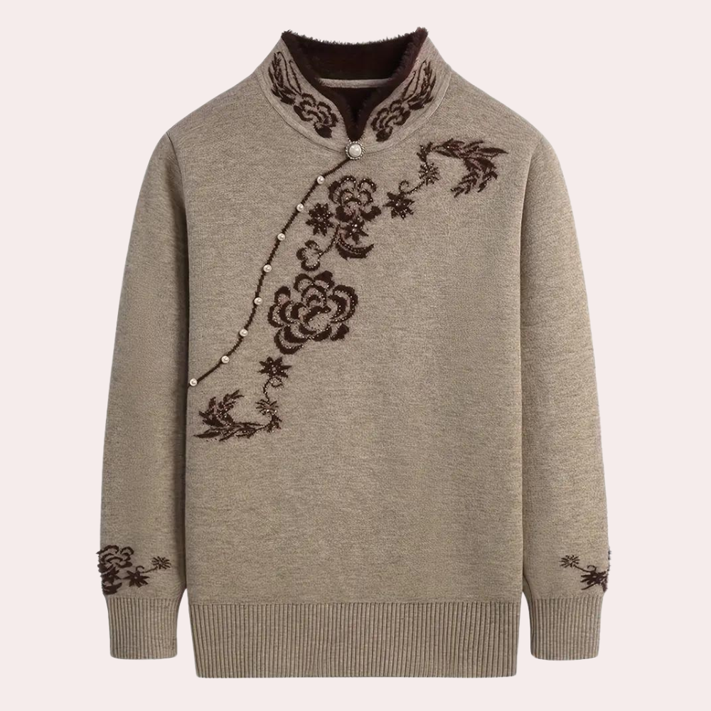 Khaki trui met hoge kraag, sierlijke bloemenborduursels en parelknopen. Stijlvolle damesmode, warme winterkleding, elegant design.