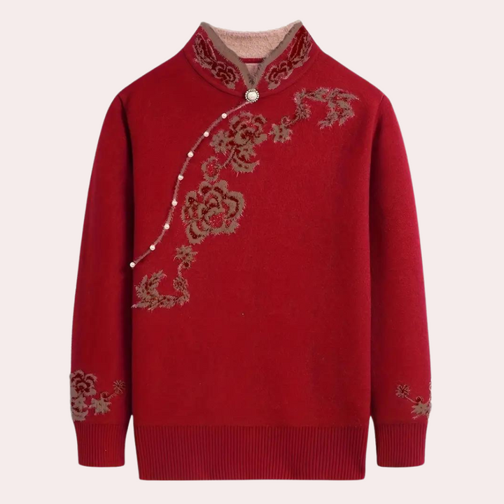 Rode damestrui met bloemenborduursel en pareldetail, hoge kraag, lange mouwen. Perfect voor herfst- en wintermode. Elegante en warme stijl.