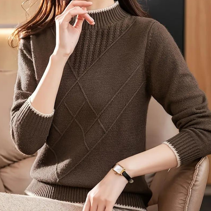 Bruine damestrui met gebreid patroon, lange mouwen en geribbelde boorden. Stijlvolle herfstmode, comfortabele en warme kleding voor dames.