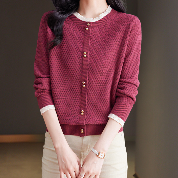 Dames vest in watermeloenrood met knoopsluiting, lange mouwen en textuurpatroon. Perfect voor casual en stijlvolle outfits.