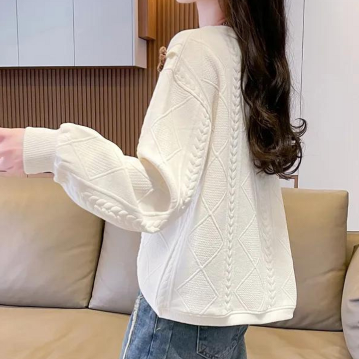 Damestrui met kabelpatroon, crèmekleurig, lange mouwen, casual stijl. Perfect voor herfstmode, comfortabele en stijlvolle outfit.