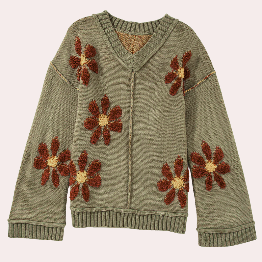 Olijfgroene trui met V-hals, gebreid patroon en bruine bloemenapplicaties. Trendy damesmode, herfstkleding, comfortabele gebreide trui.