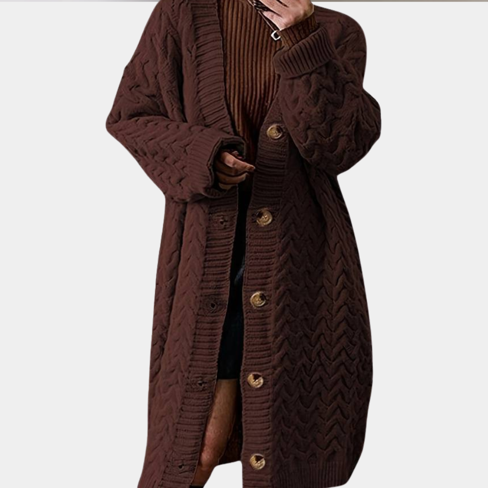 Bruine gebreide damescardigan met knopen, lange mouwen en zigzagpatroon. Perfect voor herfstmode en casual outfits. Comfortabel en stijlvol.