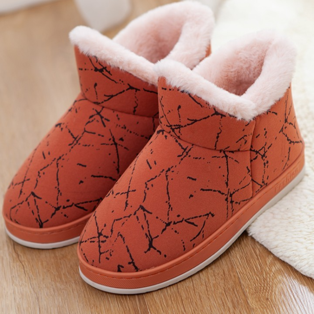 Oranje winterlaarzen met zwarte lijnen en roze voering, warme damespantoffels, antislip zool, comfortabele binnenschoenen, modieuze winteraccessoires.