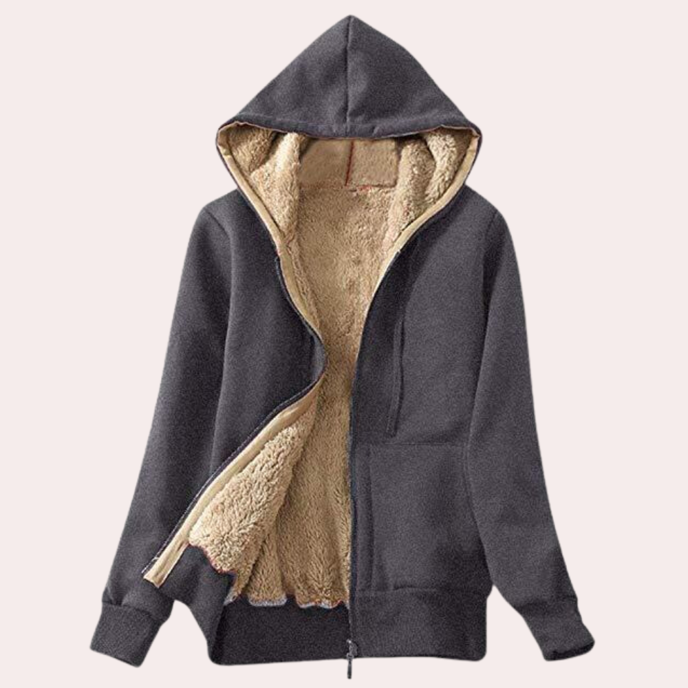 Grijze fleece hoodie met rits en capuchon, gevoerd met beige sherpa voering. Comfortabele winterjas voor heren en dames. Warm en stijlvol.