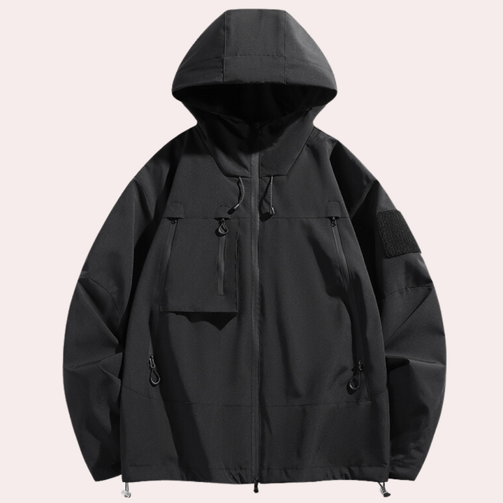 Zwarte unisex hoodie met capuchon, voorvak en ritssluiting. Ideaal voor casual streetwear. Comfortabele pasvorm, trendy en veelzijdig.