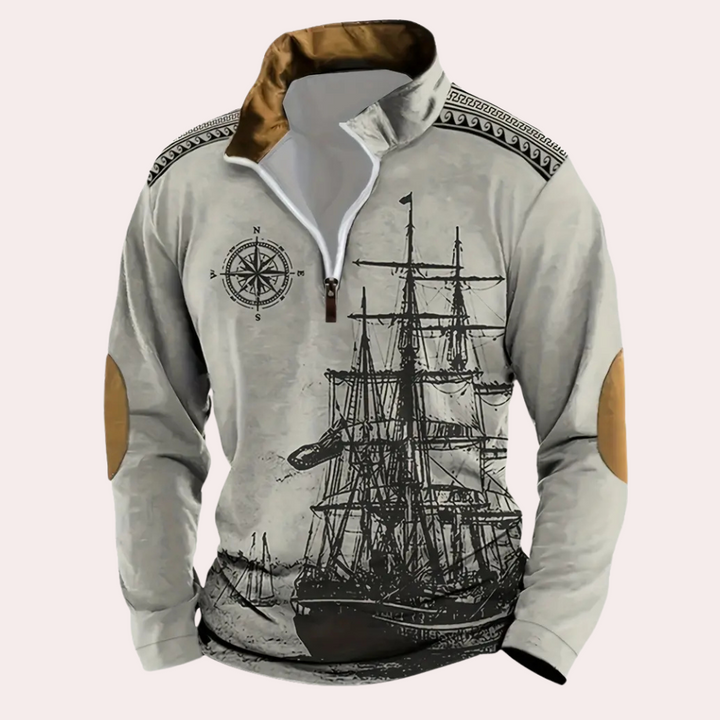 Grijze trui met opstaande kraag, kompasprint en vintage zeilschipontwerp. Perfect voor nautische mode en casual herenkleding.