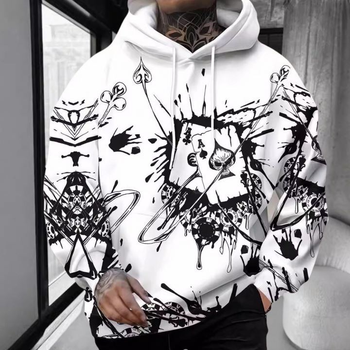 Witte hoodie met abstract zwart spatten en kaartpatronen, unisex streetwear, comfortabele pasvorm, trendy mode, geschikt voor casual outfits.