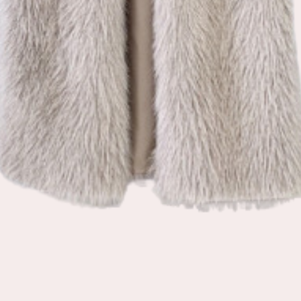 Grijze faux fur jas, zachte textuur, modieuze winterkleding, warme damesjas, trendy en stijlvol, perfect voor koude seizoenen.