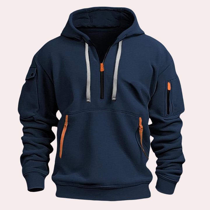 Donkerblauwe herenhoodie met capuchon, oranje ritsen en zakken, comfortabele pasvorm, modieuze streetwear, ideaal voor casual en sportieve looks.