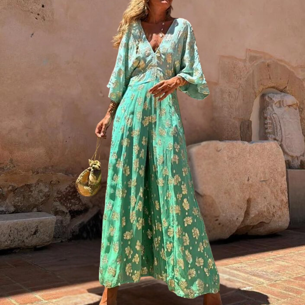 Stijlvolle dames jumpsuit, mintgroen met bloemenprint, lange mouwen, V-hals, perfect voor zomerse mode en elegante gelegenheden.
