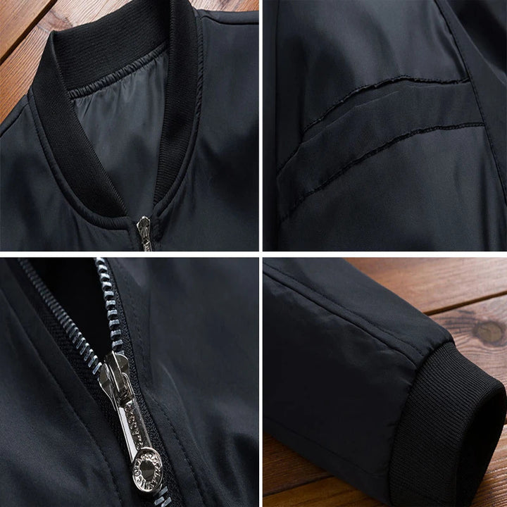 Zwarte heren bomberjack, slim fit, met ritssluiting en geribbelde boorden. Stijlvolle streetwear voor lente, ideaal voor modebewuste mannen.