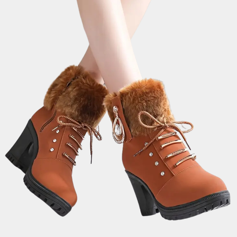 Bruine dameslaarzen met hoge hakken, bontkraag en veters. Modieuze winterlaarzen, comfortabel en stijlvol. Perfect voor koude seizoenen.