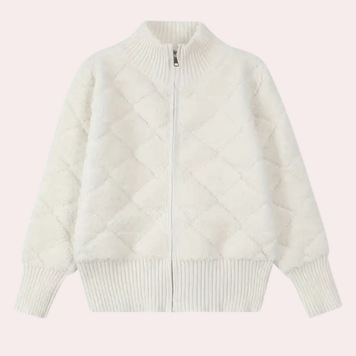 Witte gebreide damestrui met rits, geribbelde boorden en diamantpatroon. Perfect voor wintermode en casual outfits. Comfortabel en stijlvol.