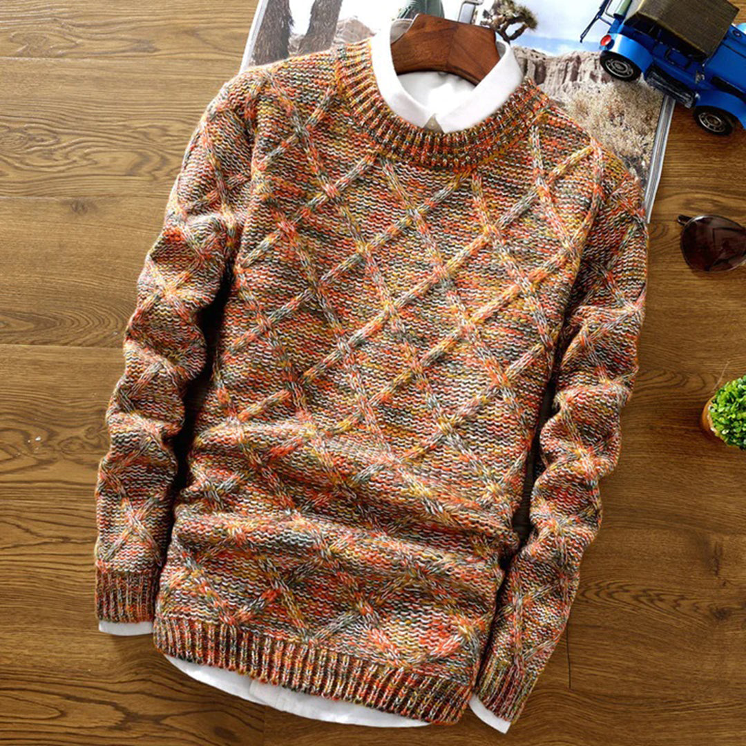 Grofgebreide herentrui met kleurrijk ruitpatroon, ideaal voor wintermode. Stijlvolle en warme trui voor heren, perfect voor koude dagen.