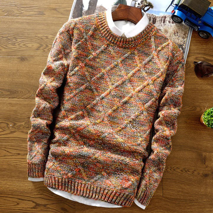 Grofgebreide herentrui met kleurrijk ruitpatroon, ideaal voor wintermode. Stijlvolle en warme trui voor heren, perfect voor koude dagen.