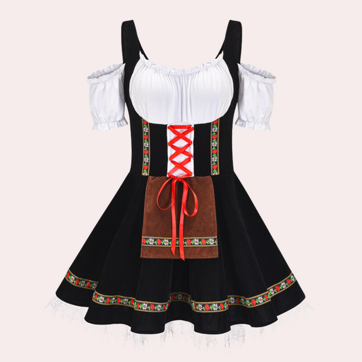 Stijlvolle dames dirndl voor Oktoberfest, zwart met witte blouse en rode details, traditionele Beierse jurk, perfecte outfit voor feest.