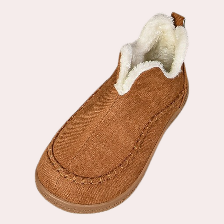 Bruine dames winterschoen met warme voering, comfortabele pasvorm en antislipzool. Perfect voor koude dagen. Ideaal voor dagelijks gebruik.
