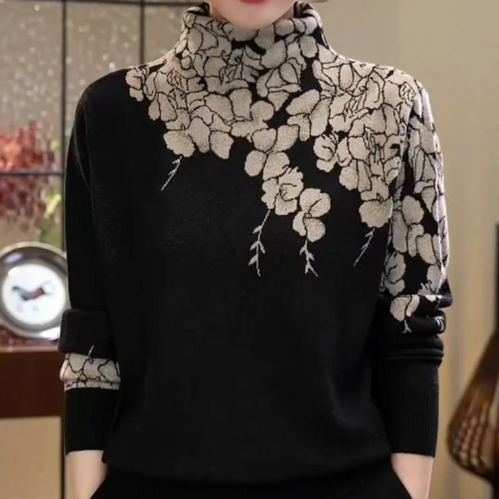 Zwarte trui met beige bloemenpatroon, coltrui damesmode, herfst-winter kleding, stijlvolle gebreide trui, casual chique outfit.