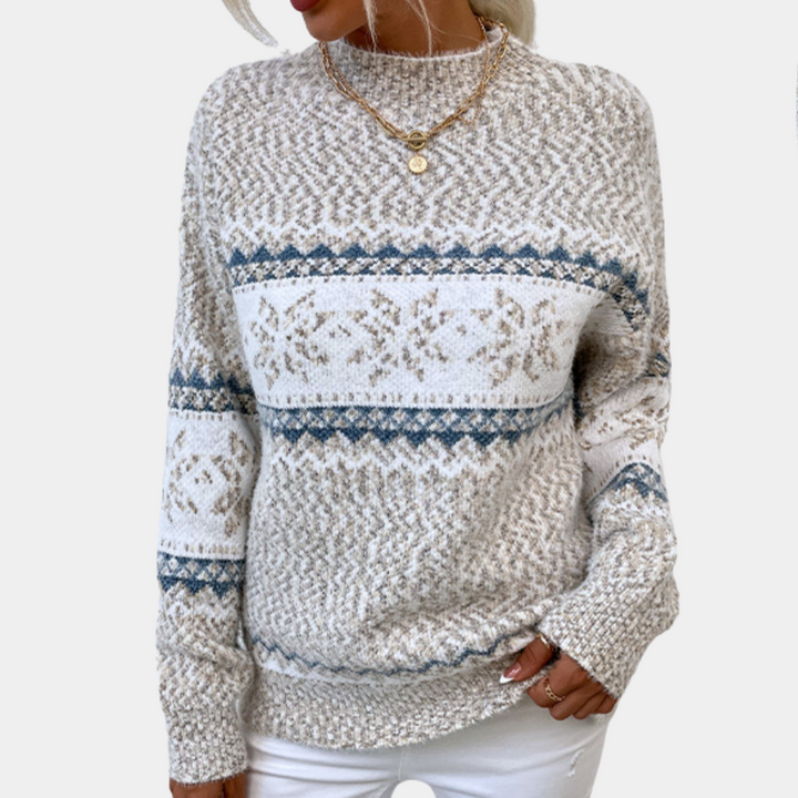 Dames kersttrui met Noors patroon, beige en blauw, gebreid, lange mouwen, ronde hals. Perfect voor wintermode en feestdagen.