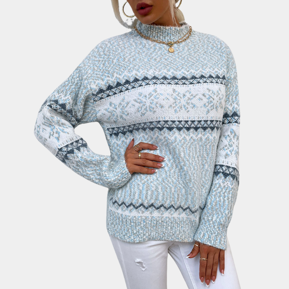 Dames kersttrui met sneeuwvlokpatroon, lichtblauw en wit, hoge kraag, lange mouwen, wintermode, comfortabele pasvorm, trendy kerstkleding.
