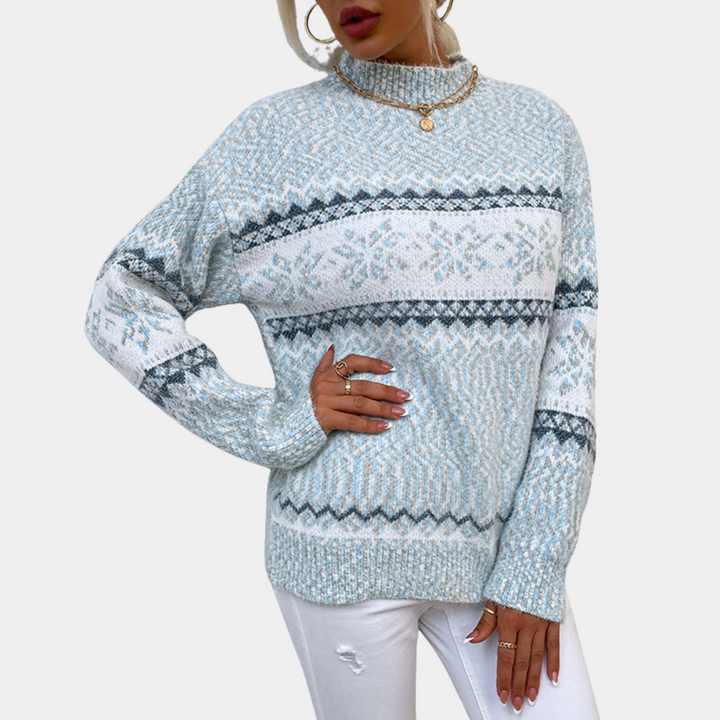Dames kersttrui met sneeuwvlokpatroon, lichtblauw en wit, hoge kraag, lange mouwen, wintermode, comfortabele pasvorm, trendy kerstkleding.