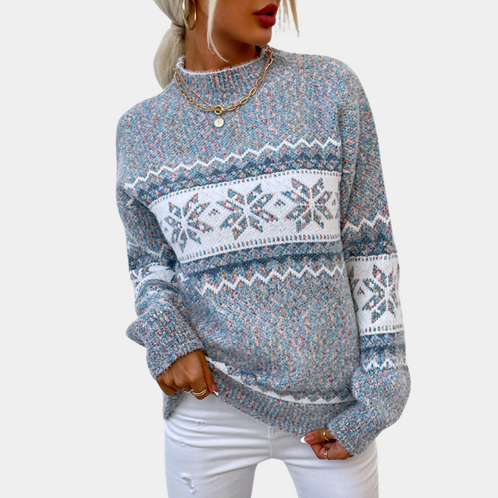 Dames kersttrui met sneeuwvlokpatroon, blauw en wit, gebreid, lange mouwen, casual wintermode, ideaal voor feestdagen en koude dagen.