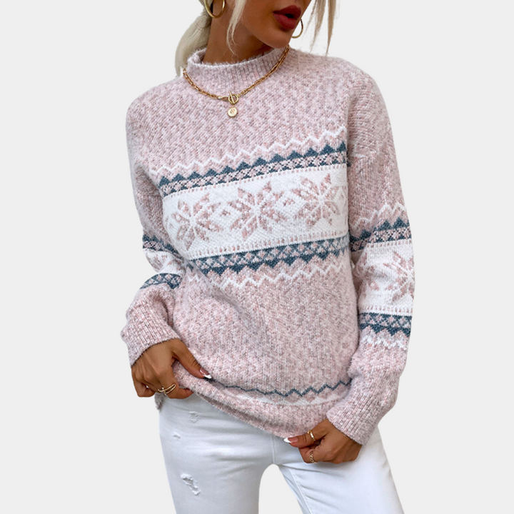 Dames kersttrui met sneeuwvlokpatroon, roze en wit, gebreid, lange mouwen, modieuze winterkleding, casual stijl, ideaal voor feestdagen.