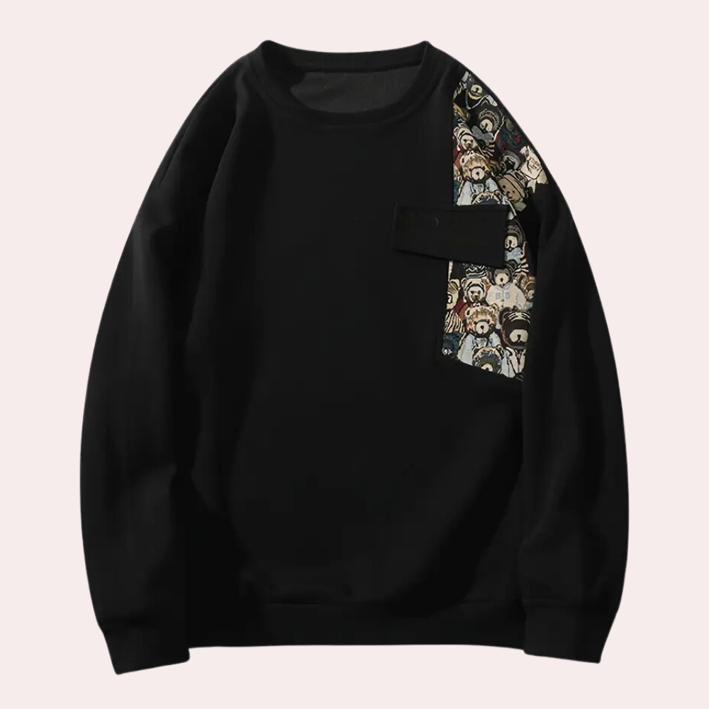 Zwarte sweatshirt met kleurrijk cartoonpatroon op de borstzak, unisex streetwear, casual mode, lange mouwen, comfortabele pasvorm.
