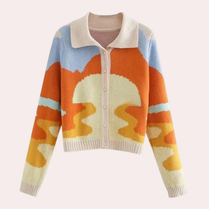 Kleurrig gebreid vest met abstract patroon, lange mouwen en knoopsluiting. Trendy damesmode, herfstkleding, comfortabele en stijlvolle trui.