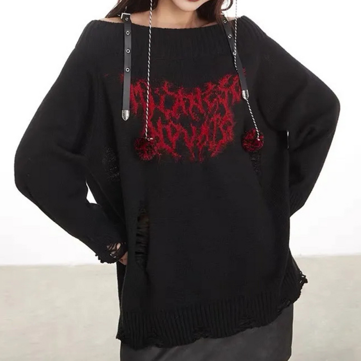 Zwarte oversized trui met rode grafische print en metalen details, trendy streetwear mode, unisex design, comfortabele pasvorm, casual stijl.