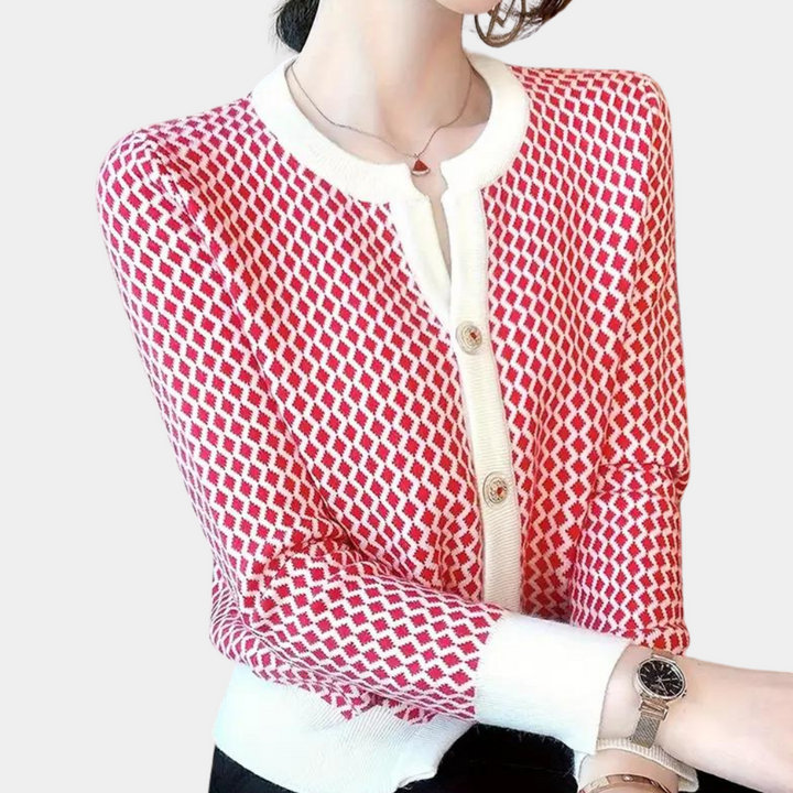 Damestrui met rood-wit ruitpatroon, ronde hals en knoopsluiting. Modieuze gebreide cardigan, perfect voor casual en chique outfits.
