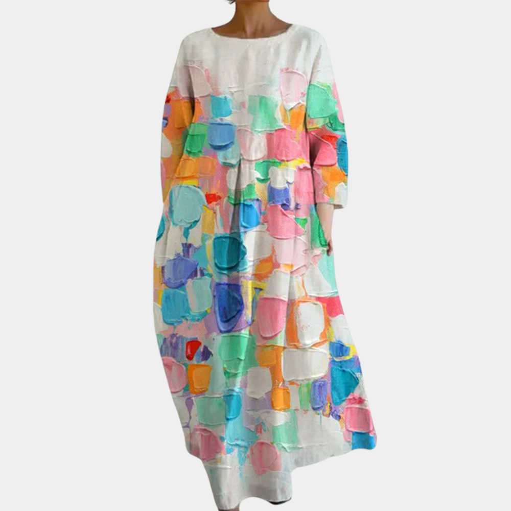 Kleurrijke casual damesjurk met abstracte patronen, lange mouwen en losse pasvorm. Perfect voor lente- en zomermode. Comfortabele en stijlvolle outfit.