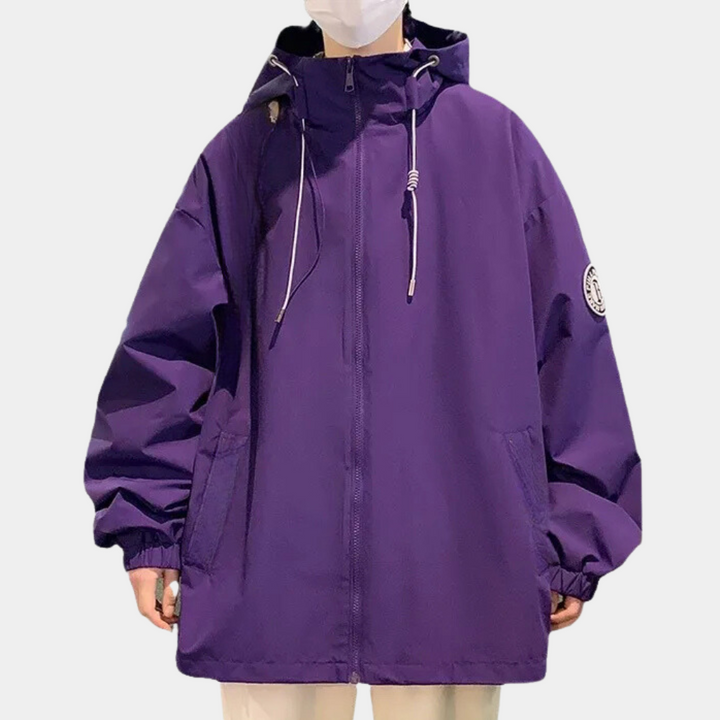 Paarse unisex windjack met capuchon, ritssluiting en zakken. Trendy streetwear jas, ideaal voor herfst en winter. Comfortabele pasvorm.