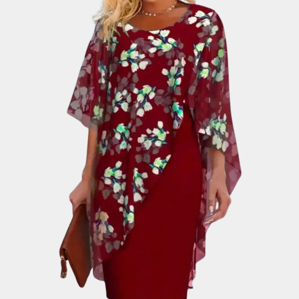 Elegante dames bloemenjurk, bordeauxrood met kleurrijke bloemenprint, ideaal voor lente en zomer. Perfecte keuze voor stijlvolle gelegenheden.